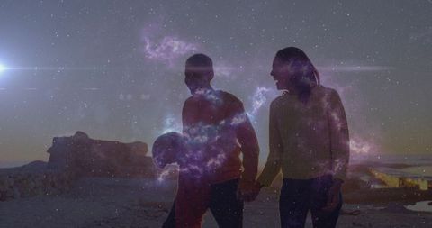 Couple Hand in Hand Amidst Celestial Evening Shoreline Walk
