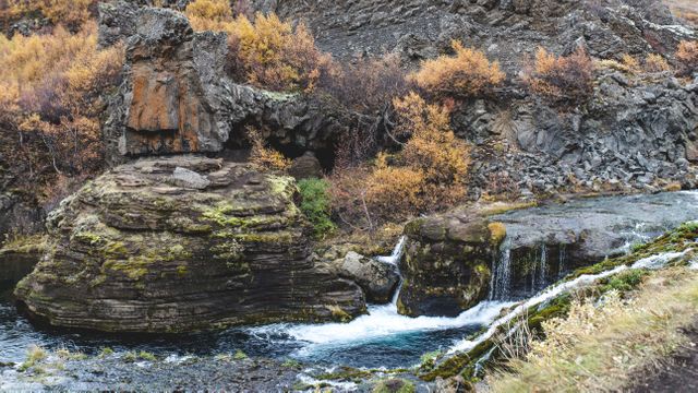 Serene Autumn Mountain Stream with Rocky Landscape and Waterfall - Download Free Stock Photos Pikwizard.com