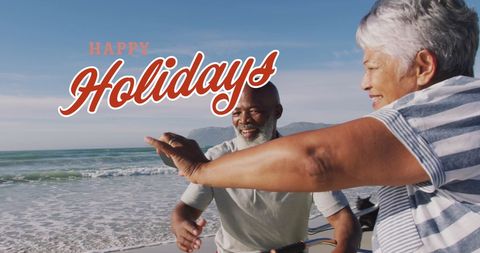 Senior Couple Enjoying Festive Beach Holiday