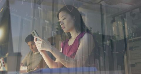 Diverse Professionals Analyzing Digital Financial Data at Work