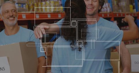Volunteers Embracing in a Warehouse Environment - Download Free Stock Images Pikwizard.com