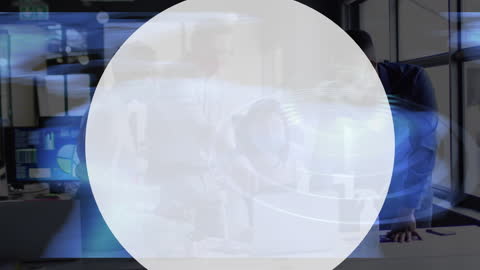 Innovative Team Collaborating in Modern Office with Data Overlay