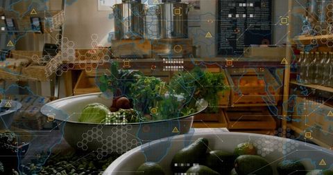 Displaying bowls of fresh avocados and leafy greens with digital supply chain overlay