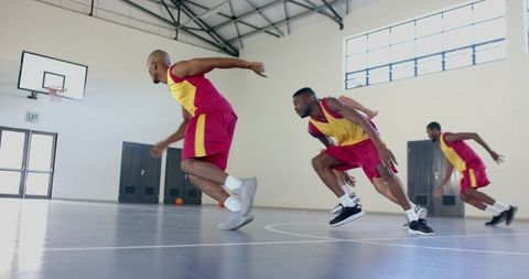 Basketball Athletes Performing Agility Drills Indoors in Slow Motion - Download Free Stock Images Pikwizard.com