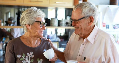 Senior Couple Enjoying Coffee Together at Home
