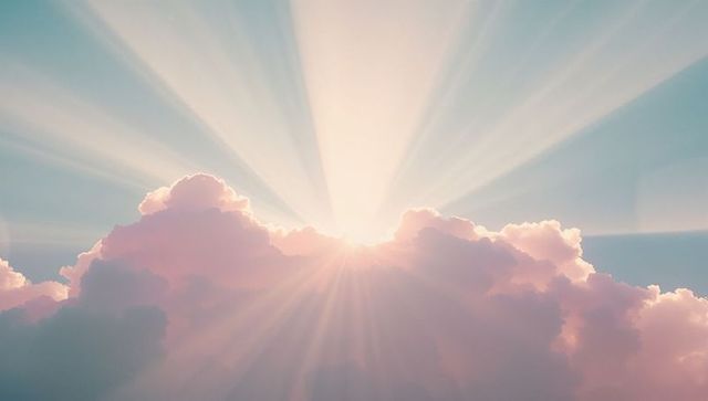 Sunrise Sun Rays Illuminate Pastel Cloudscape