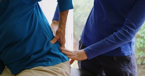 Elderly Woman Receiving Back Physiotherapy Treatment - Download Free Stock Images Pikwizard.com