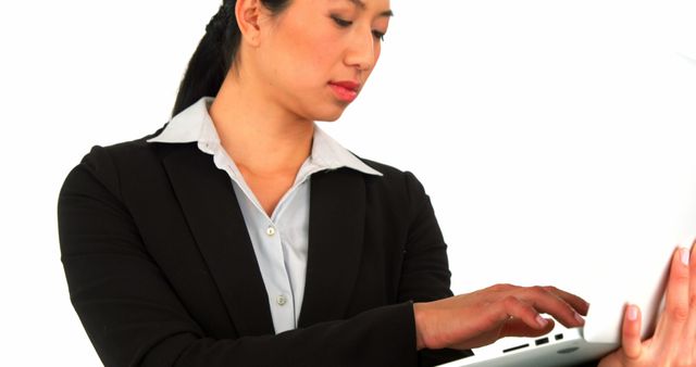 Professional Businesswoman Typing on Laptop Isolated on White Background - Download Free Stock Images Pikwizard.com