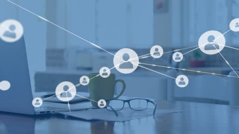 Digital Network Overlay with Laptop and Glasses on Desk