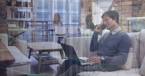 Professional Using Laptop and Phone in Modern Office Lounge - Download Free Stock Images Pikwizard.com