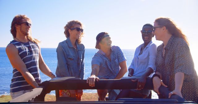 Cheerful Friends Gathering Outdoors by the Sea - Download Free Stock Images Pikwizard.com