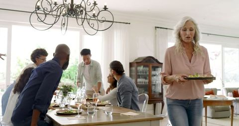Family Enjoying Celebration Meal with Joy and Togetherness
