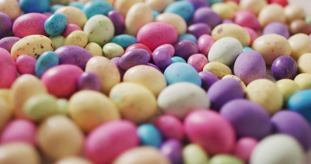Bright and colorful assortment of Easter eggs, providing a festive look perfect for holiday celebrations, creative craft projects, or as decorations for an Easter party. These eggs in pastel shades symbolize joy and renewal associated with the Easter holiday.