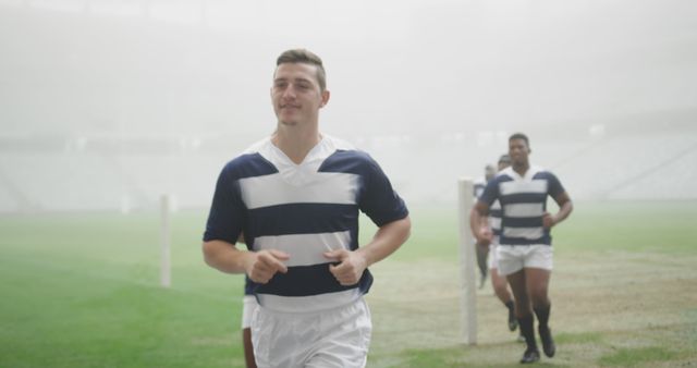 Rugby Players Warming Up in Foggy Stadium - Download Free Stock Images Pikwizard.com