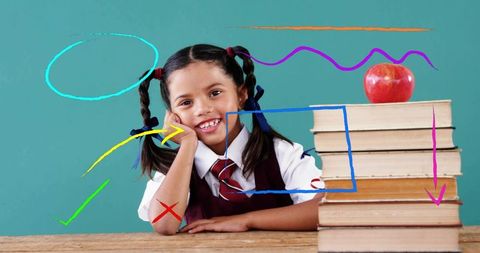 Cheerful schoolgirl in uniform with books and creative doodles