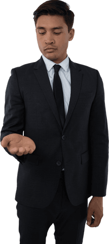 Thoughtful Businessman Examining Empty Palm Isolated on Transparent Background - Download Free Stock Videos Pikwizard.com