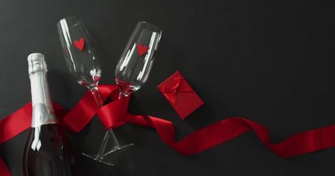 Romantic Valentine's Day Champagne Glasses with Red Ribbon
