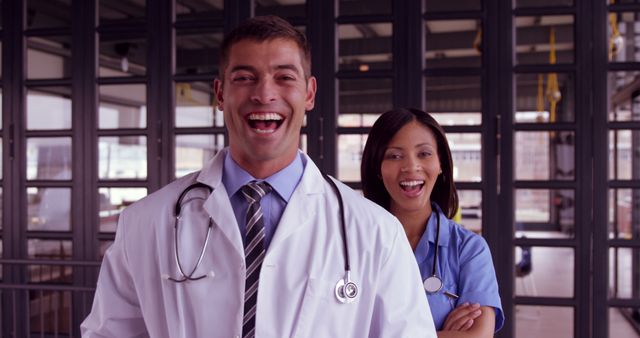 Smiling Medical Professionals Standing Together in Hospital - Download Free Stock Images Pikwizard.com