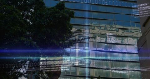 Reflecting glass facade with warped reflections, binary code overlay and blue light flares