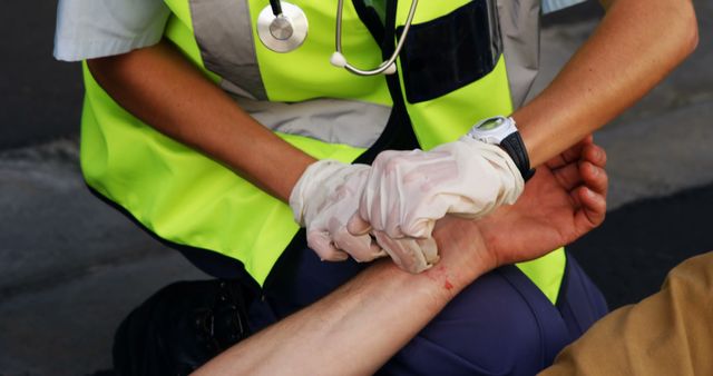 Emergency Medical Responder Assisting Injured Person with First Aid - Download Free Stock Images Pikwizard.com