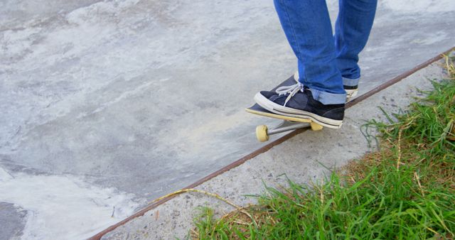 Person skateboarding on concrete edge close-up of feet - Download Free Stock Images Pikwizard.com