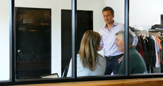 Casual Office Meeting through Glass Window - Download Free Stock Images Pikwizard.com