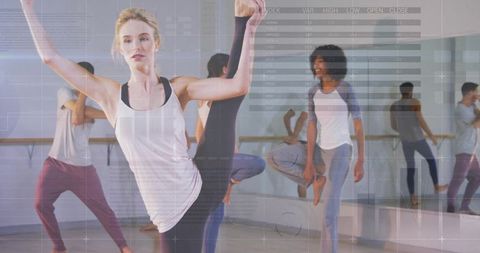 Divers Group Engaged in Stretching Exercise at Dance Studio