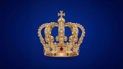 Ornate british empire golden crown with gemstones on deep blue background
