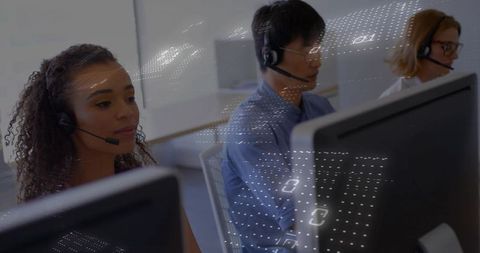 Multicultural contact center team wearing headsets answering calls with data overlay