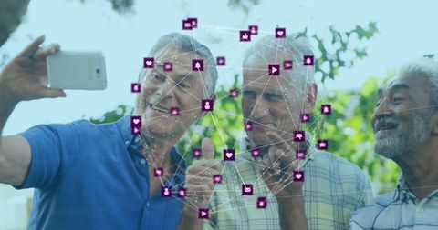 Senior Friends Interacting with Technology and Social Media