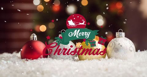 Festive Christmas Baubles with Merry Christmas Greeting on Snow
