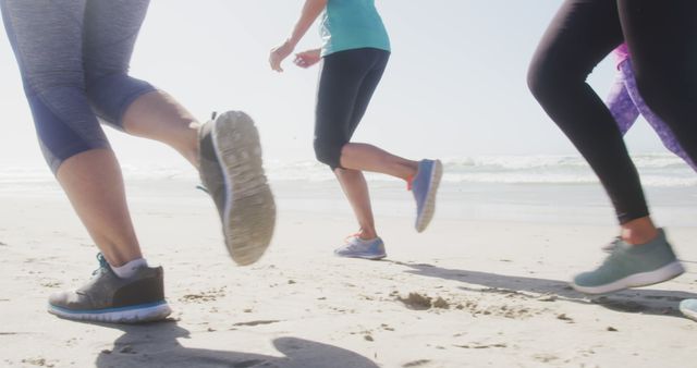 Group of Active People Running on Beach - Download Free Stock Images Pikwizard.com