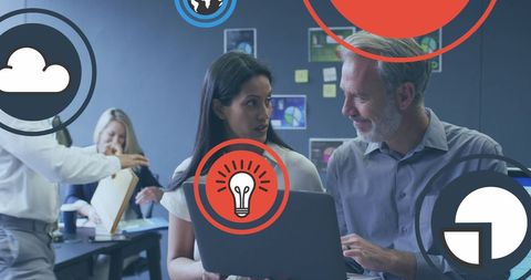 Diverse coworking team collaborating on innovative ideas
