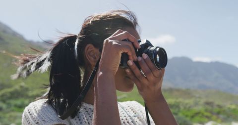 Woman Exploring Mountain Landscape and Photographing Nature - Download Free Stock Images Pikwizard.com