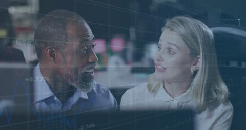 Business Professionals Analyzing Data in Office Environment