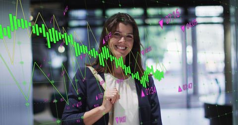 Businesswoman analyzing stock market data visuals in office