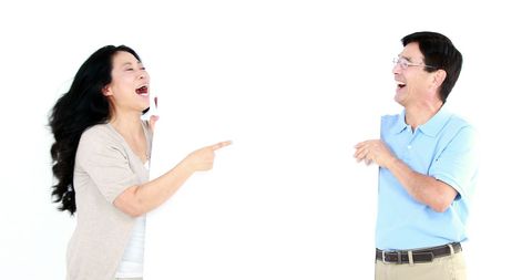 Asian Couple Laughing Holding Blank Sign with Copy Space - Download Free Stock Images Pikwizard.com