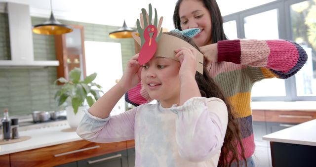 Mother Helping Daughter Create Thanksgiving Handprint Turkey Craft - Download Free Stock Images Pikwizard.com