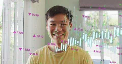 Smiling Man with Overlaying Financial Graphs Indoors