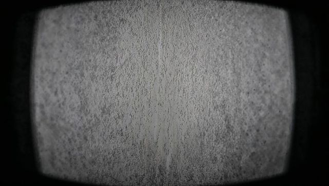 Monochrome Static Noise on Vintage TV Screen
