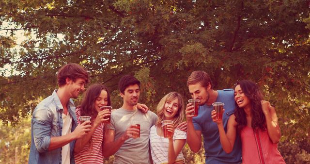 Young Friends Drinking Beer Outdoors and Laughing - Download Free Stock Photos Pikwizard.com