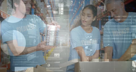 Warehouse Volunteers Analyzing Financial Data Together