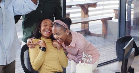 Joyful Birthday Celebration in Office with Happy Colleagues