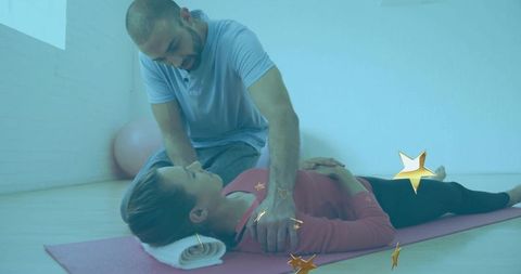 Physical Therapist Assisting Patient in Therapy Session