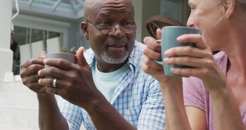 Happy Senior Couple Enjoying Coffee Together Outdoors - Download Free Stock Images Pikwizard.com