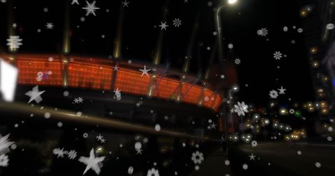 Night cityscape with falling stars effect