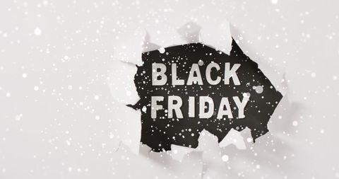 Black Friday Text with Snow Falling Background