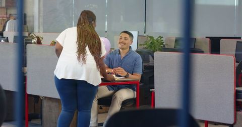 Friendly workplace birthday celebration in modern office setting