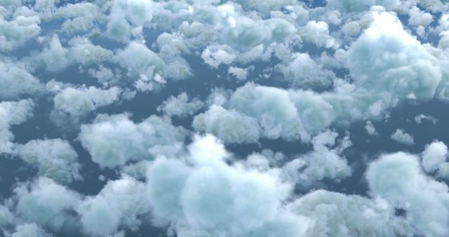 A serene expanse of fluffy white clouds fills the view, creating a tranquil and dreamy atmosphere. The image evokes a sense of calm and might be used as a peaceful background or for visualizing concepts related to weather, heaven, or flights of fancy.