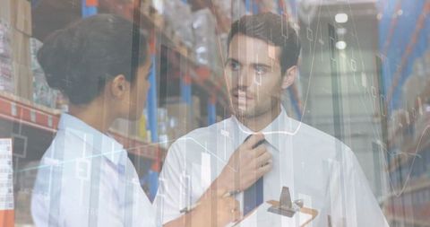 Warehouse Team Analyzing Data with Overlay Graphics